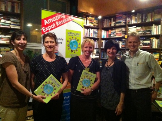 Authors Cherie Emigh and Kathryn Tonges greet TCK parents Mai Britt Klass, Lene Moller Andersen and Patrice Pare at The Bookworm 'Slurping Soup' event