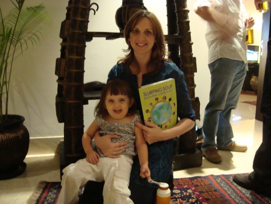 Michaela Stockey-Bridge with daughter Anouk at a party at Kerry's in New Delhi. 